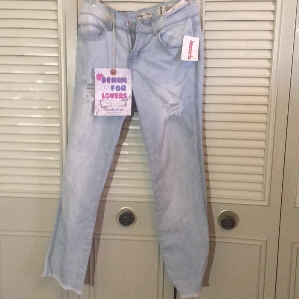 never worn ripped blue jeans